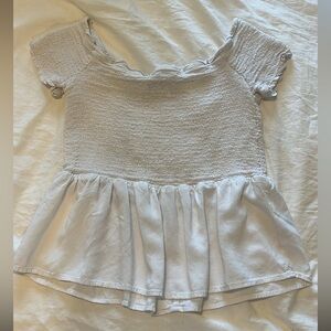 Francesca’s white off the shoulder top